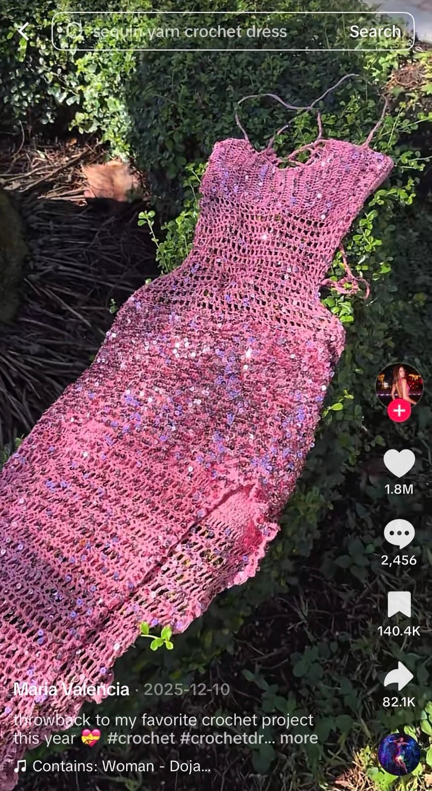 Viral TikTok — the pink sequin crochet dress laid flat on greenery, 1.8 million likes.